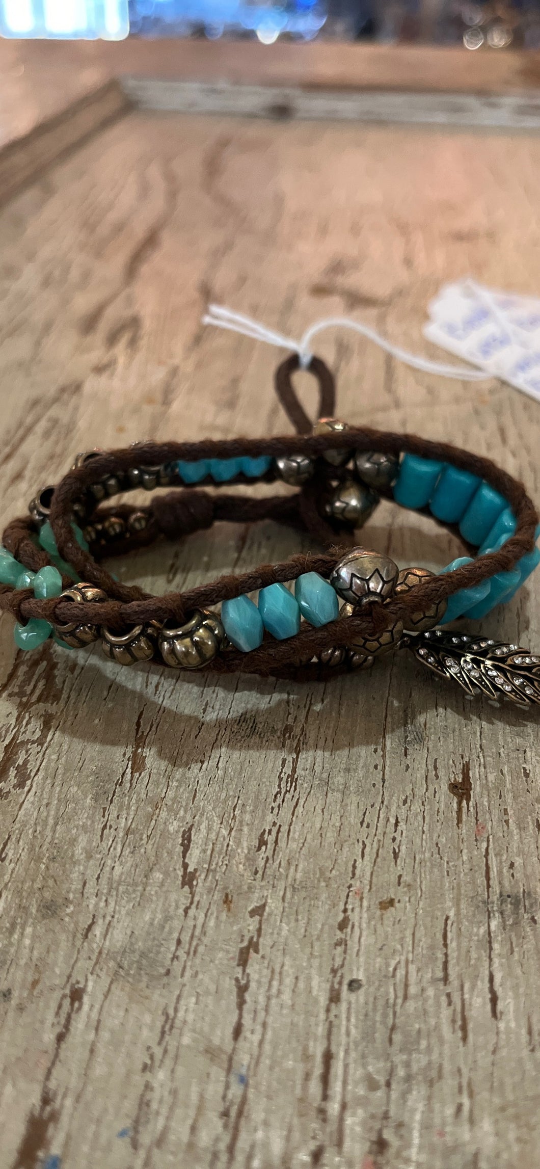 Bracelet -wrap turquoise color beading - brown rope